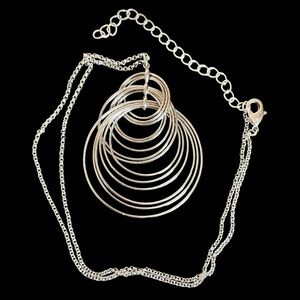 Vintage Joan Rivers Classics Collection Silver Plated Infinity Rings Necklace